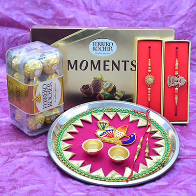 Ferrero Rocher Moments and 16 Pc Chocolates with 2 Bhai Rakhi and Peacock Rakhi Pooja Thali Hamper