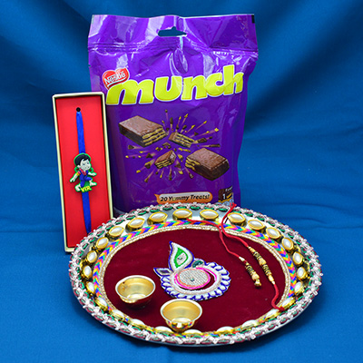 Munch Chocolates Pack with Kid Rakhi and Maroon Base Flower Rakhi Pooja Thali