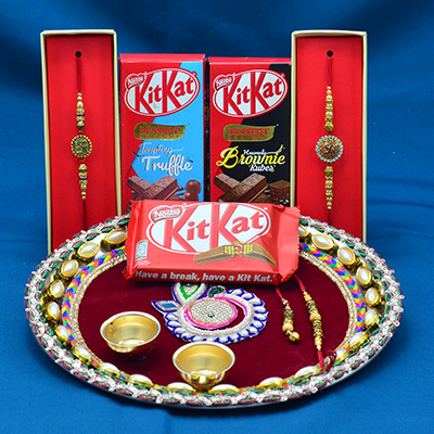 Three Kitkat Chocolates Hamper with 2 Stunning Looking Brother Rakhis and Puja Thali