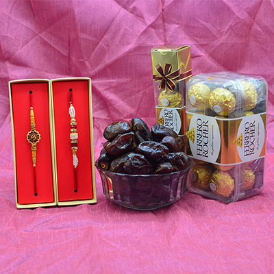Delicious Ferrero Rocher Chocolates with 2 Stunning Looking Brother Rakhis and Pind Khajoor Dry Fruit