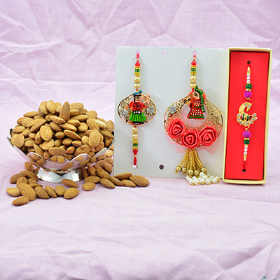Rich Looking Brother and Bhabhi Rakhis along with 1 Rakhis for Brother and Almonds Dry Fruit