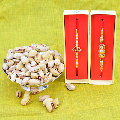 2 Pearl and Ganesha Brother Rakhi along with Dry Fruit of Fresh Pista