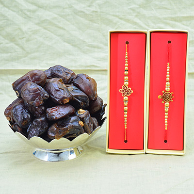Ganesha and Om Rakhi for Brothers with Delicious Sweet Pind Khajoor