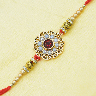 Breathtaking Design of Pearl and Diamond Studded Designer Rakhi