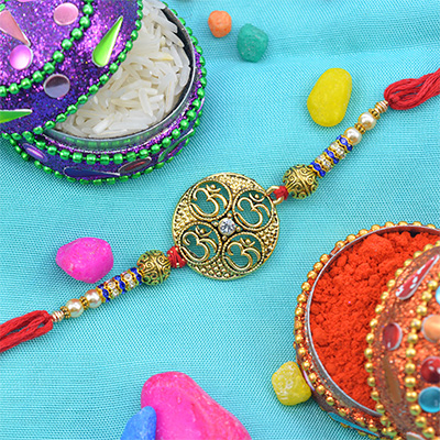 Four Om Circular Gold Pate with Jewel Designer Rakhi