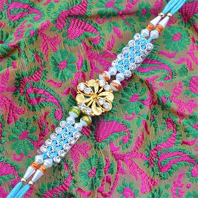 Sky Blue Colored Golden Butterfly and Beads Designer Rakhi