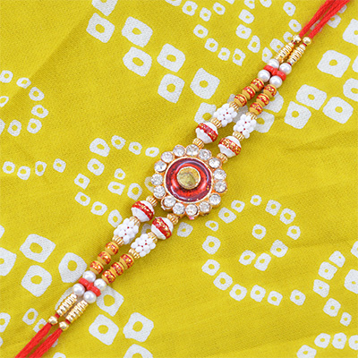 Meena Work Flower in Mid with White and Golden Beads Rakhi for Brother