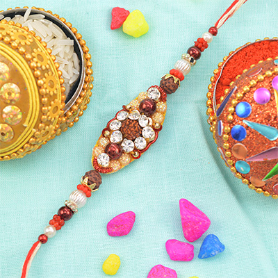 Divine Rudraksha in Mid Surrounded with Jewels Amazing Looking Fancy Rakhi