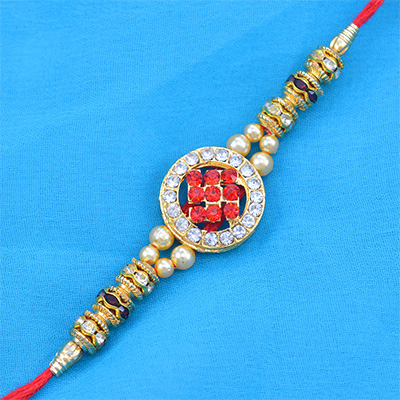 Fascinating Swastik Studded in Center with Shining Rounded Diamonds in Red Silk Thread