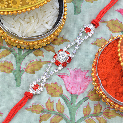 Alluring Flower Shape Multicolor Diamonds in Graceful Red Silk Thread