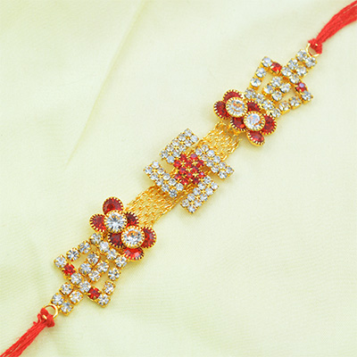 Marvelous Golden Swastik Studded with Multicolor Jewels Flowers