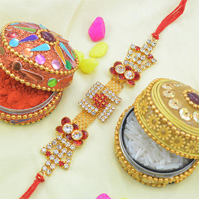Marvelous Golden Swastik Studded with Multicolor Jewels Flowers