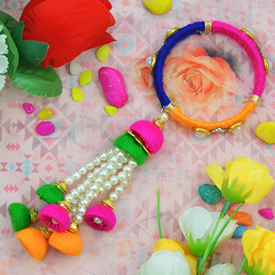 Designer Studded Beads on Colorful Lumba Rakhi for Bhabhi