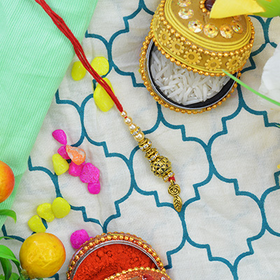 Leaf in End Golden Designer Beads Attractive Looking Lumba Rakhi