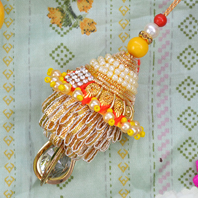 Hanging Transparent Bead Glorious Looking Golden Lumba Rakhi