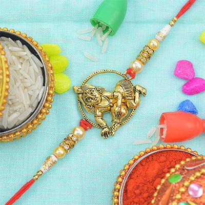 Fascinating Eye-Catching Bal-Krishna Rakhi with Attractive Graceful Pearls