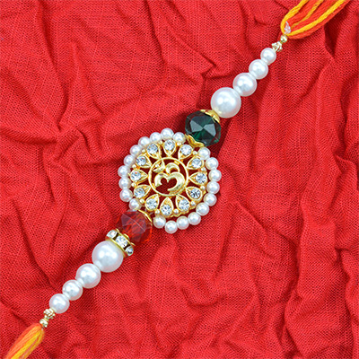 Gorgeous Golden OM With Diamonds Studded in Shining Pearls with Colorful Silky Thread