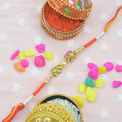 Gorgeous Golden Elephants with Graceful Multicolor Beads in Silky Thread