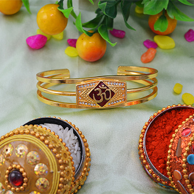 Wonderful Golden OM Rakhi Bracelet with Shining White Diamonds