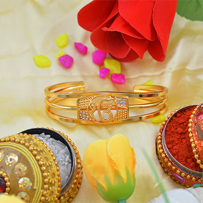 Marvelous Golden Diamond Work Rakhi Bracelet