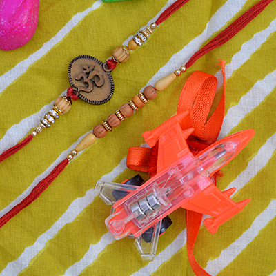 Liner Beaded Brother Rakhi with One Airplane Kid Rakhi and Om Brother Rakhi Set of 3 Rakhis