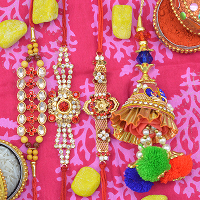 Antique Designs Golden Color Jewel Studded 3 Brother Rakhis with 1 Lumba Bhabhi Rakhis Set of 4