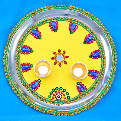 Yellow Colored Base with Flower in Mid Elegant Looking Pooja Rakhi Thali