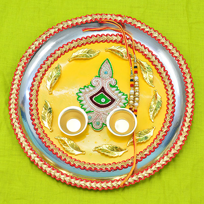 Flower Surrounded with Leafs Stunning looking Yellow Color Rakhi Puja Thali