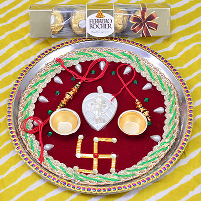 Ferrero Rocher 4 Pc with Swastika Studded Maroon Base Rakhi Pooja Thali