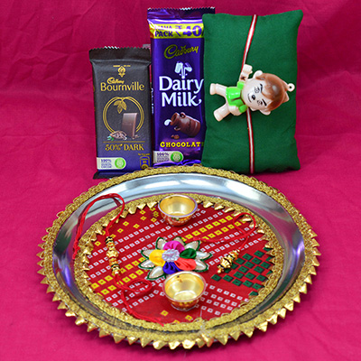 Cadbury Small Dairy Milk and Bournville Chocolates with Flower in Mid Elegant Looking Rakhi Pooja Thali