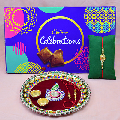 Jewel Brother Rakhi with Cadbury Celebration and Unique Design Maroon Color Rakhi Pooja Thali