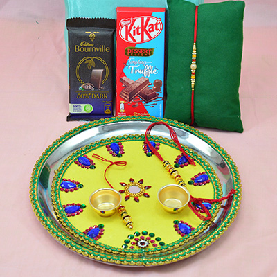 Bournville and Kitkat Chocolates with Rakhis and Light Yellow Base Attractive Looking Rakhi Pooja Thali