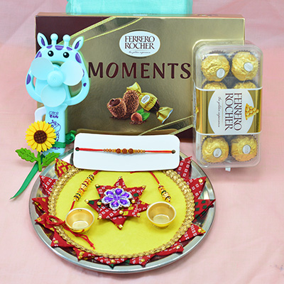Ferrero Rocher Moments and 16 Pc Chocolates Pack with Yellow Base Nice Looking Flowerish Rakhi Pooja Thali
