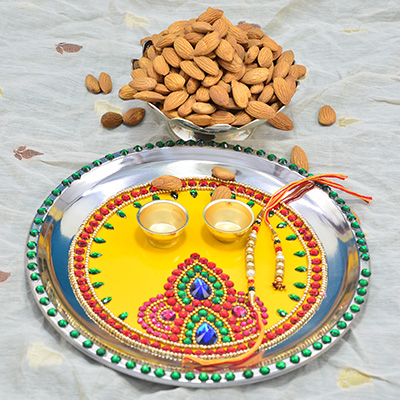 Almonds Dry Fruits with Yellow Base Jewel Studded Attractive Looking Rakhi Pooja Thali