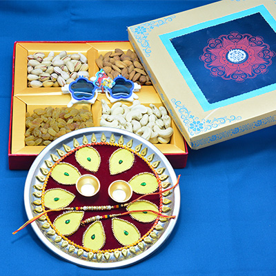 4 Types of Different Branded and Fresh Dry Fruits with Simple Looking Leaf Made Puja Thali