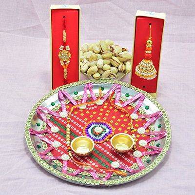 Unique Base and Handcrafted Rakhi Pooja Thali with Pista Dry Fruits and Rakhis