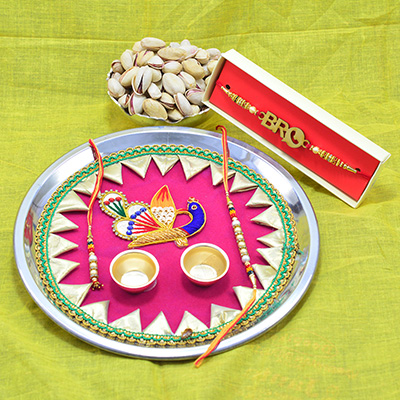 Bro Written Rakhi with Delicious Pista Dry Fruits and Simple and Attractive Looking Puja Thali