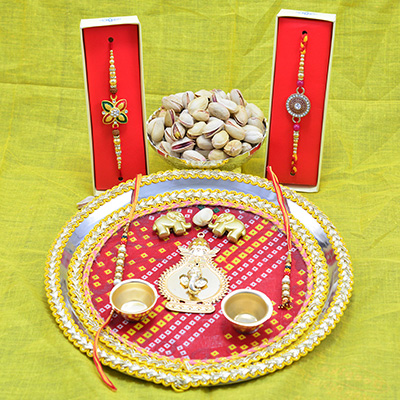 Pure Quality Proof Pista Dry Fruits with Ganesha Studded Rakhi Pooja Thali Hamper