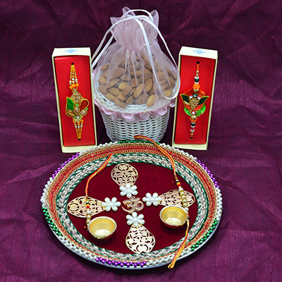 Amazing OM Crafted Pooja Thali with Delicious Almonds with Rakhi