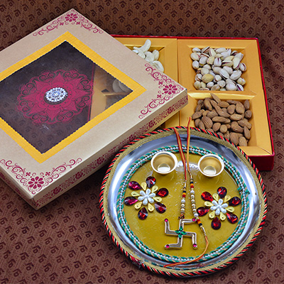Eye Catching Flower and Swastik Pooja Thali with Luscious 4 Types of Dry Fruits