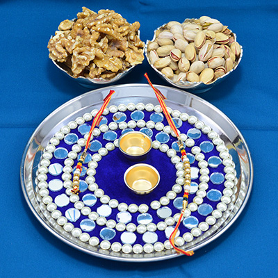 Amazing Crafted Beautiful Rakhi Pooja thali with tasteful Walnut and Pista Dry Fruit