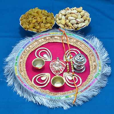Gorgeous Rakhi Pooja Thali with Delicious Kismis and Pista Dry Fruits