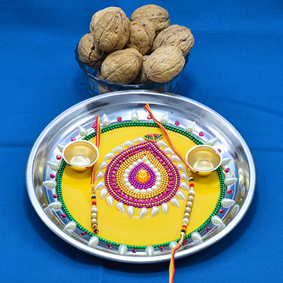 Gorgeous Multicolor Pearl Crafted Rakhi Pooja Thali with Walnut