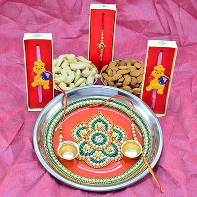 Eye Catching Multi color beads crafted Pooja Thali with Delicious Kaju and Badam