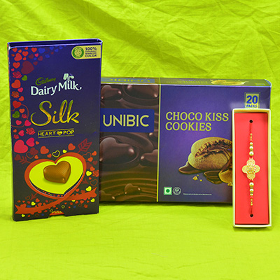 Attractive Rakhi with Relish Cadbury Dairy Milk Silk and Exclusive Choco Kiss Cookies