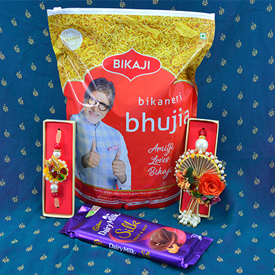 Amazing Zardosi work bhaiya bhabhi rakhi with tasty Cadbury Dairy Milk Silk and Bikaji Bikaneri Bhujia