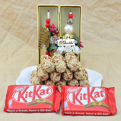 Stunning Bhaiya Bhabhi Rakhi with Luscious Kaju Butterscotch Roll with 2 Yummy Kitkat Chocolates