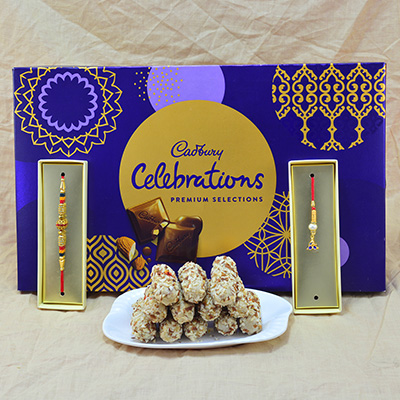 Amazing Pearl Rakhi with Eye Catching Lumba Rakhi and Delicious Kaju Butterscotch Roll with tasty Cadbury Celebrations