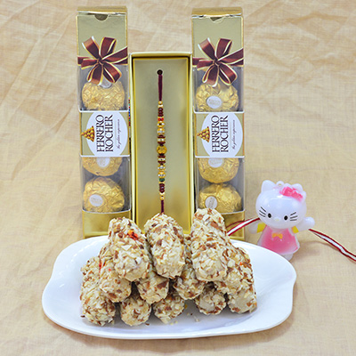 Marvelous Beads and Kids Rakhi with savory Kaju Butterscotch Roll with Delicious Ferrero Rocher