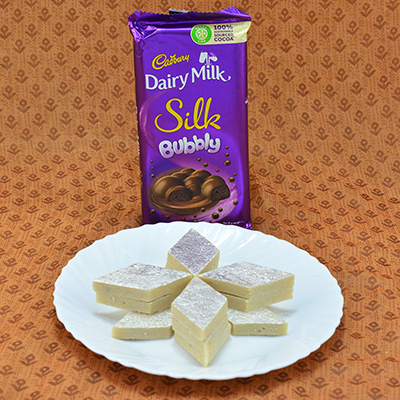 Palatable Kaju Katli with savory Cadbury Dairy Milk Silk Bubbly Hamper